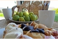 Figs and cakes on the balcony